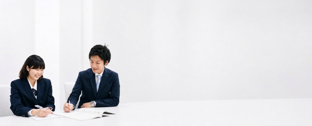 講師とマンツーマンで授業を受ける生徒